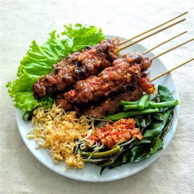  Sate Rembiga: Een pikante en zoete dans van smaken op je smaakpapillen!